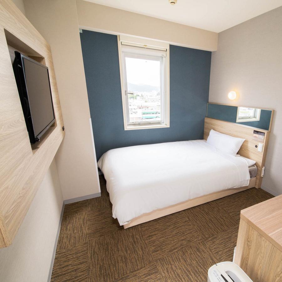 Super Hotel Okinawa Nago Bagian luar foto