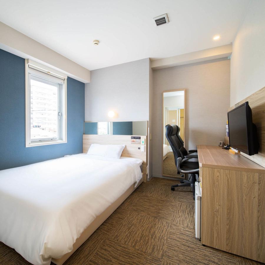 Super Hotel Okinawa Nago Bagian luar foto